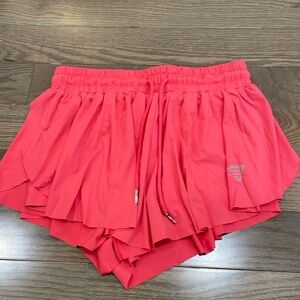 Hot pink flowwy shorts with tight shorts built inside